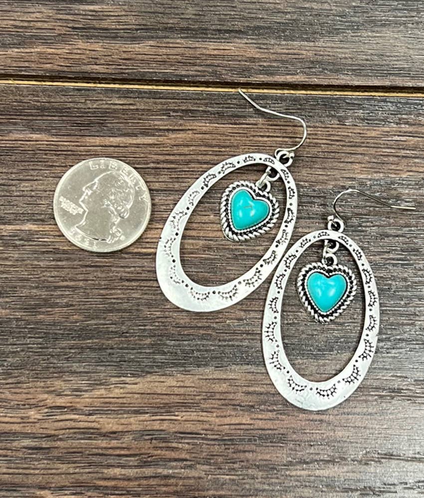 Stylish affordable ranch-style earrings with turquoise heart accents and silver oval design