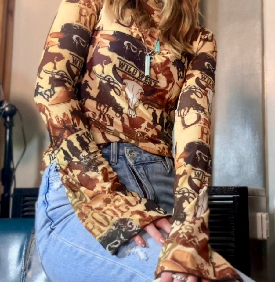 Lucky & Blessed Cowboy coffee mesh top featuring western-themed prints and long sleeves
