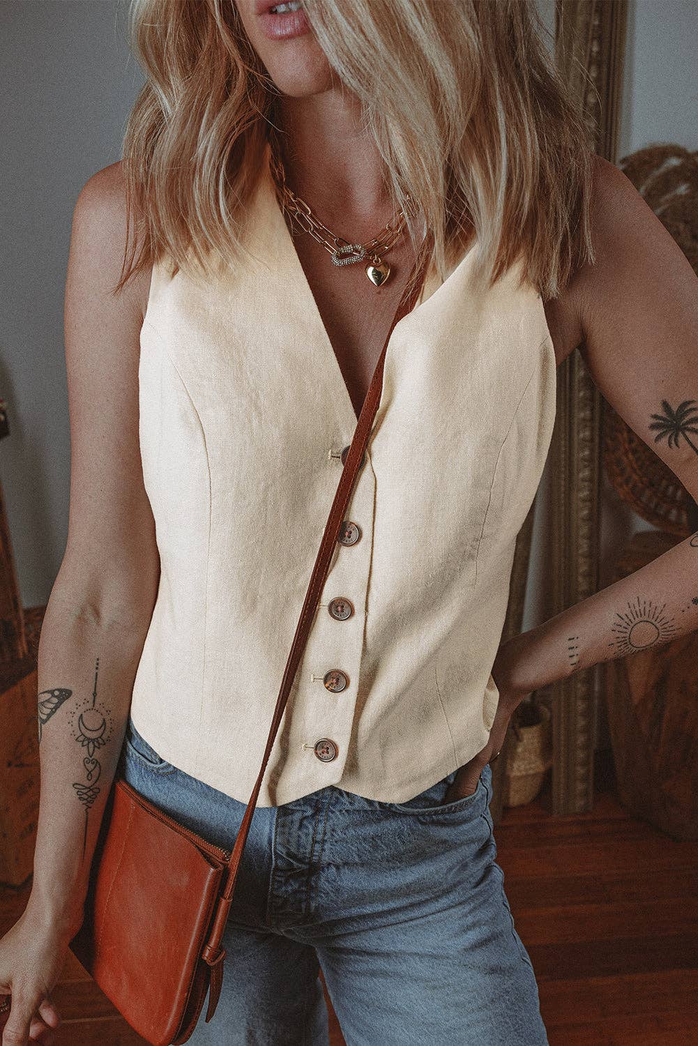 Cream button vest women featuring a stylish design with a flattering fit and classic buttons