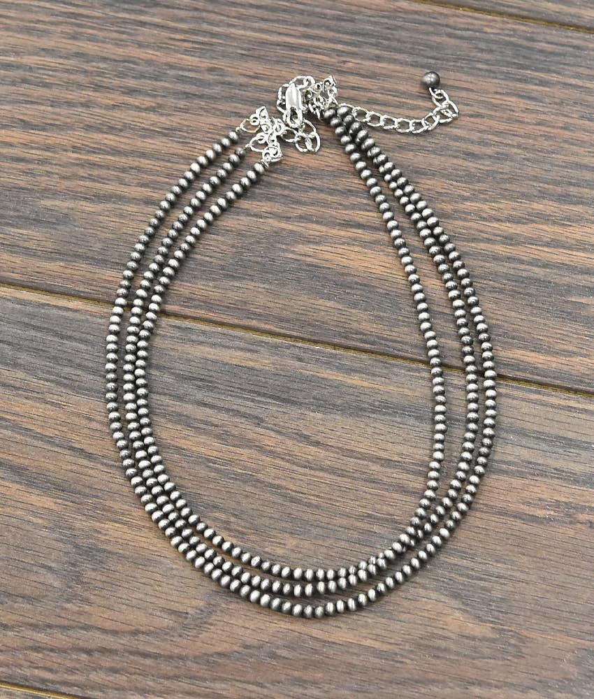 Handmade Navajo bead necklace featuring multiple strands for a unique layered style