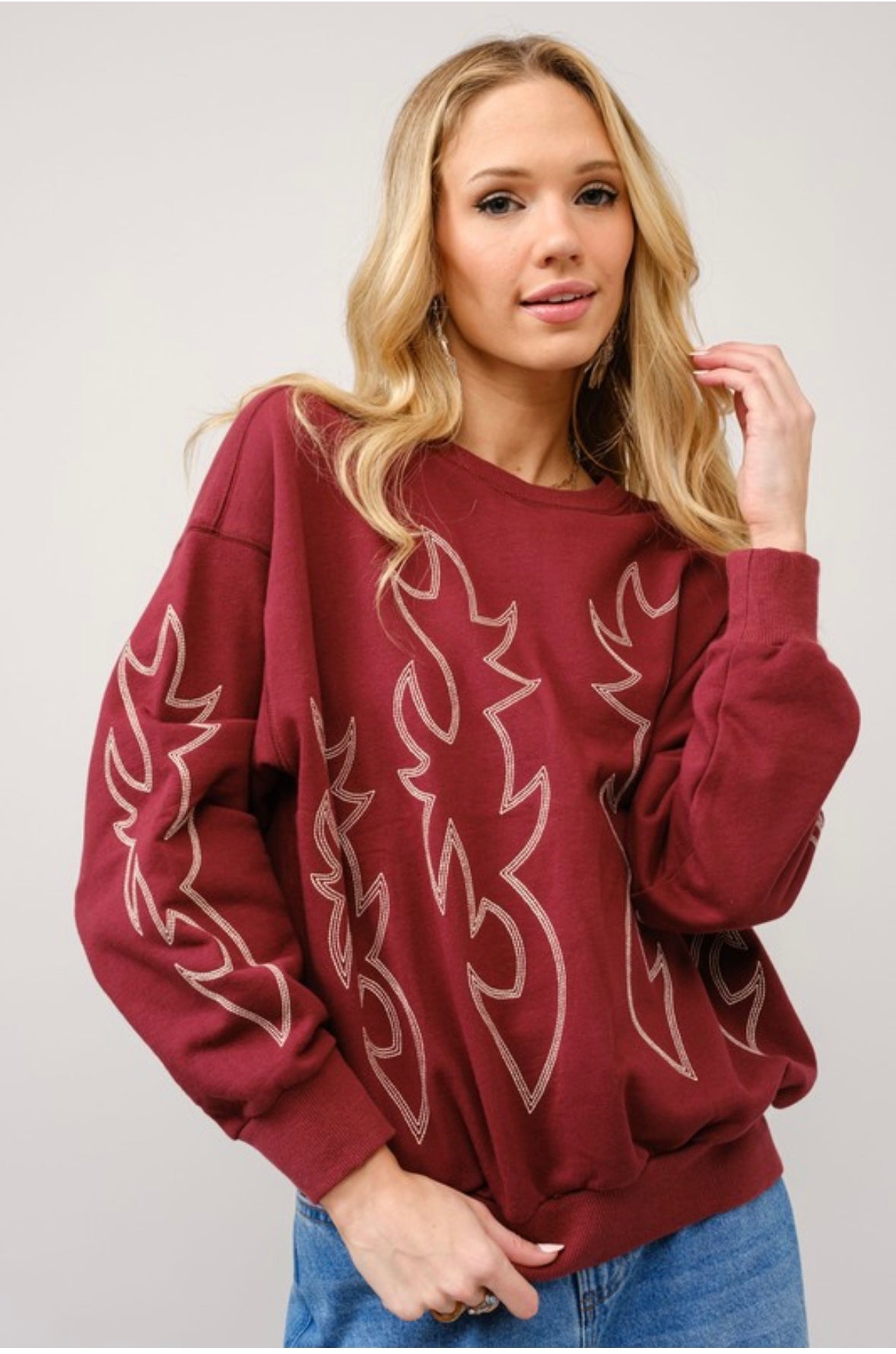 Maroon Western boot stitch sweater featuring stylish embroidered flame design for a trendy look