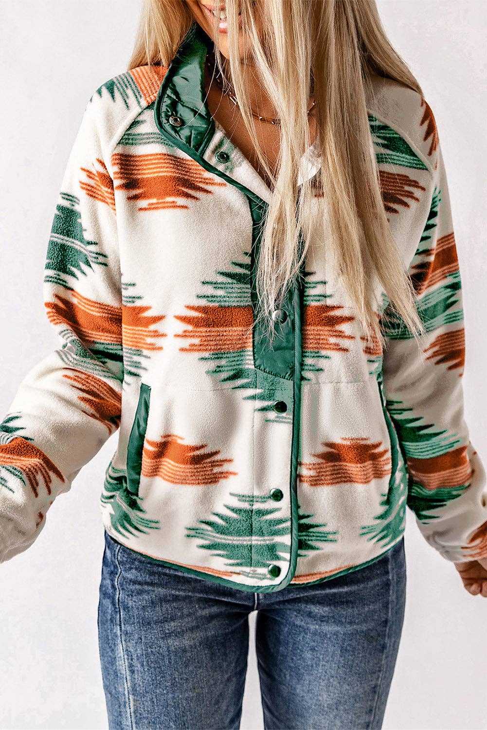 Stylish Women's Aztec Jacket featuring a colorful pattern and button details, perfect for any casual outfit