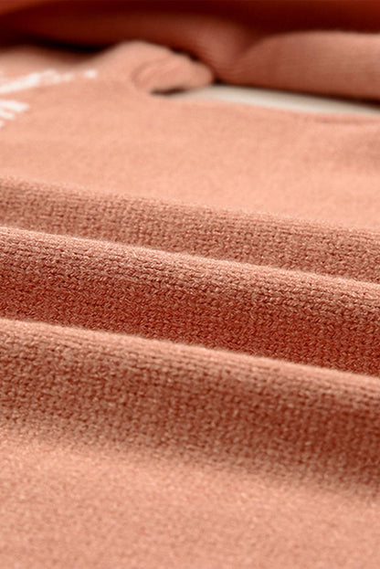 Close-up of a soft fabric texture of a PRETTY BASH boho western quarter zip apparel