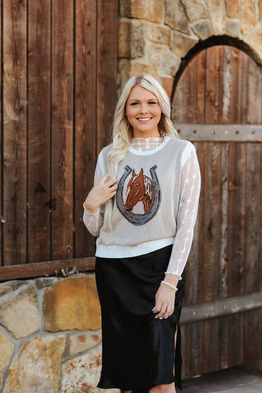 Stylish horse print tops from 2 Fly Co featuring a horse graphic on a cozy sweater