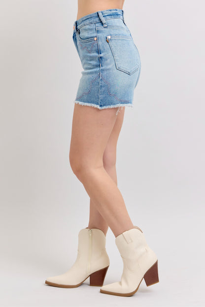 Judy Blue denim shorts featuring a frayed hem and a fitted silhouette for casual summer outfits