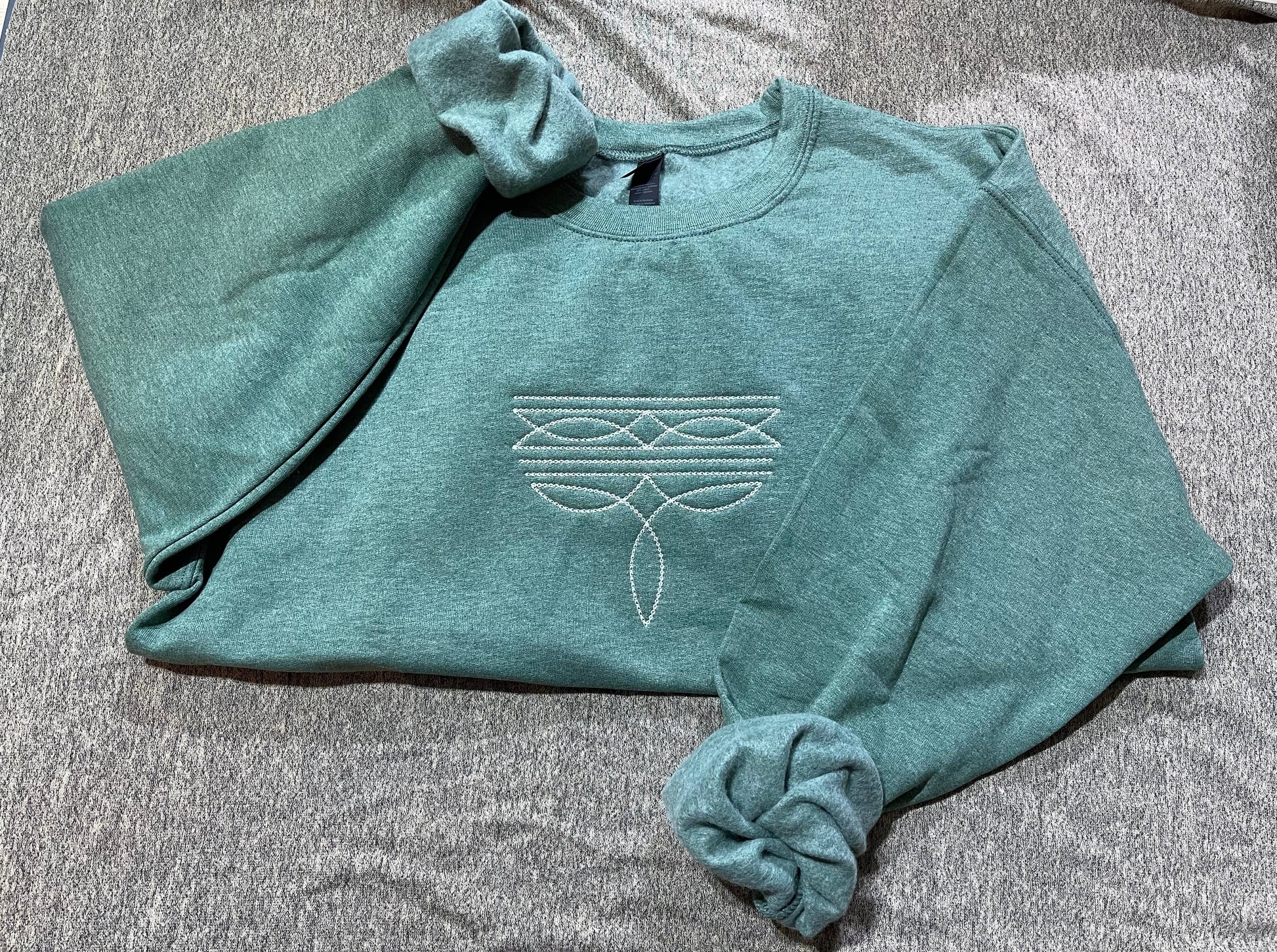 Basil & Burch ranch style boot stitch sweater in teal with decorative stitching design and relaxed fit