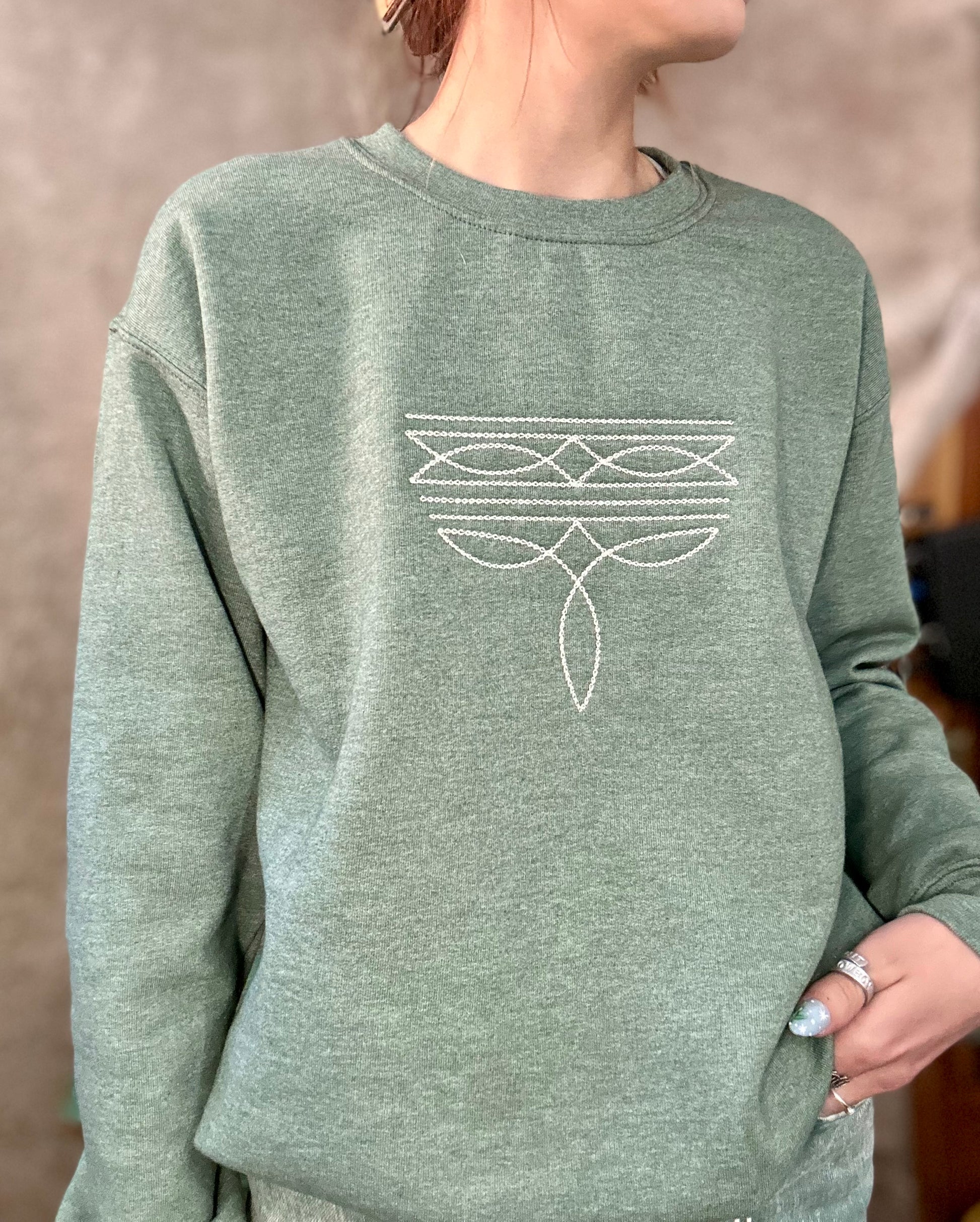 Basil & Burch ranch style boot stitch sweater in green with unique embroidered design