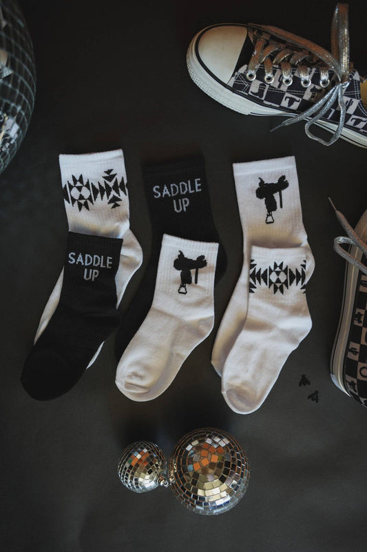 Sock Em Silly Saddle Mono Kids Socks in black and white with fun designs for playful outfits